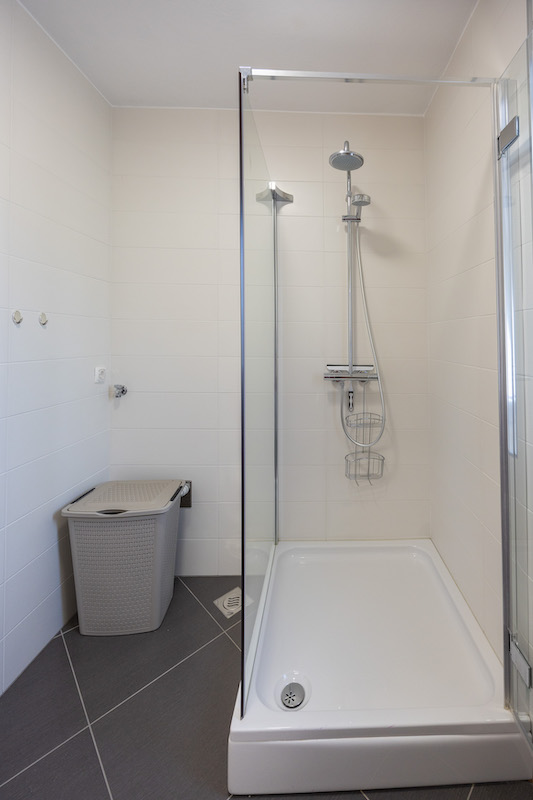 Bathroom with glass shower enclosure