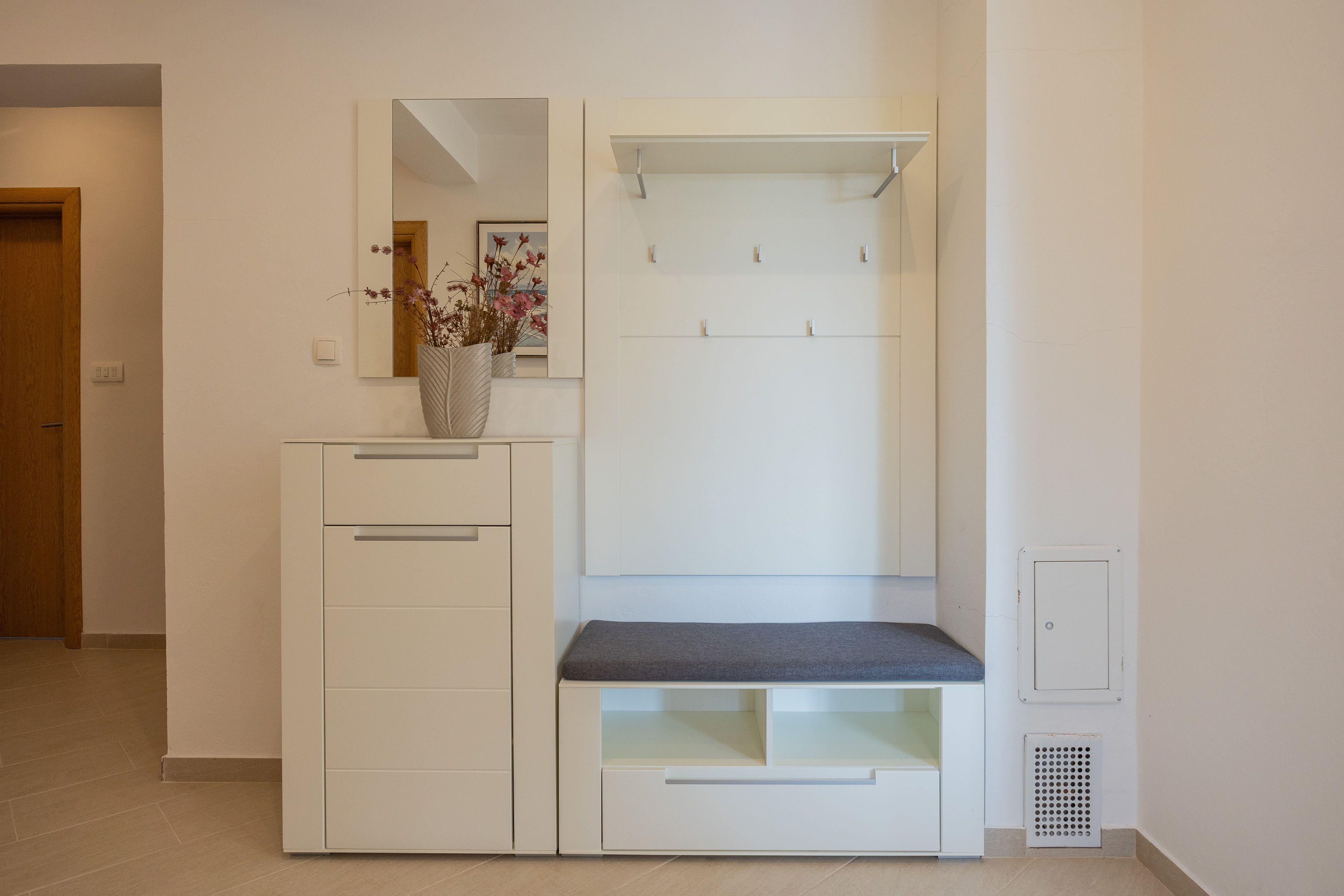 Entrance hall with coat rack and mirror